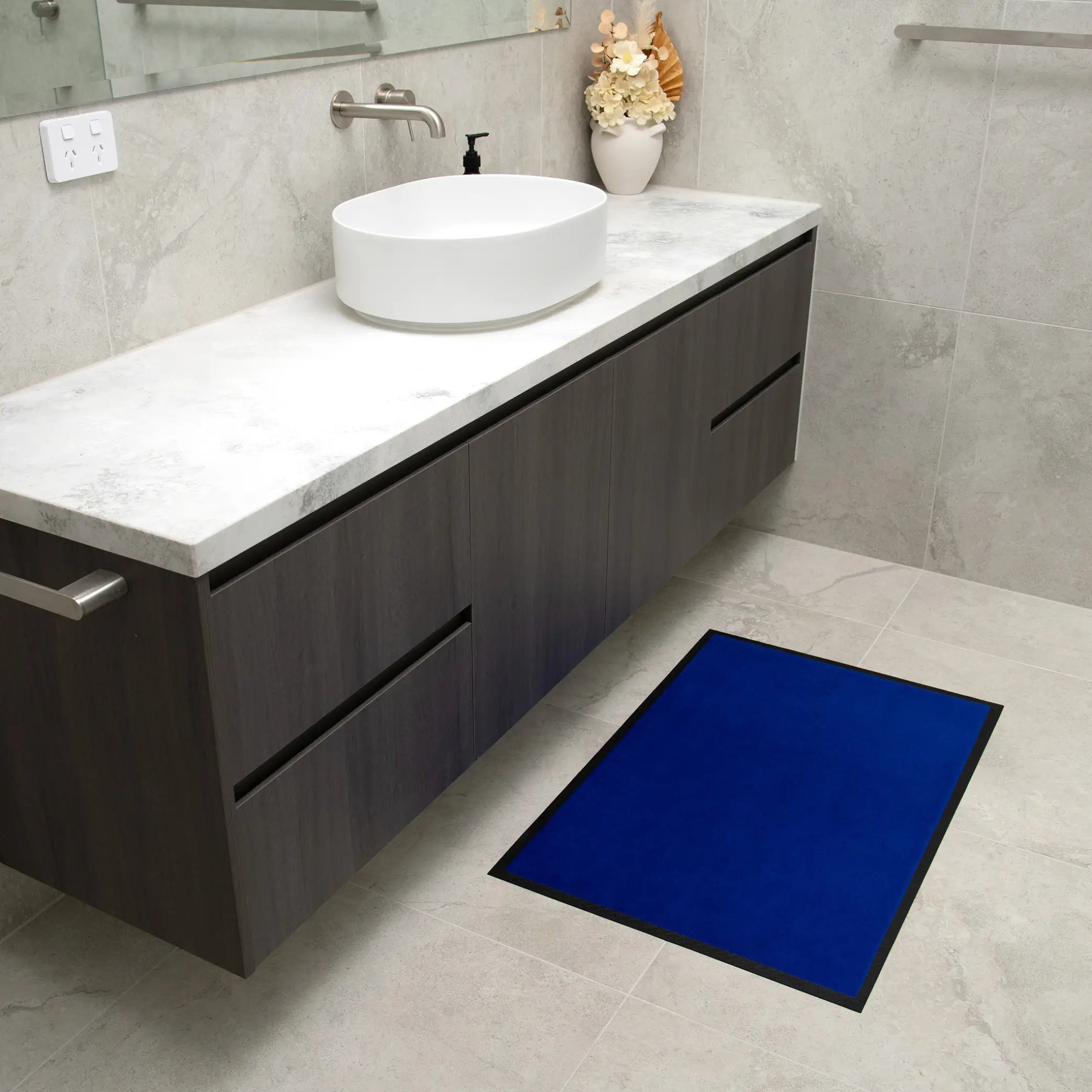 Royal blue non-slip waterproof floor mat designed for bathrooms and high-traffic areas. Featuring an absorbent, quick-dry surface with a slip-resistant backing, this durable mat provides superior moisture control and floor protection. Ideal for elderly care, incontinence support, or modern home décor, this easy-to-clean mat.