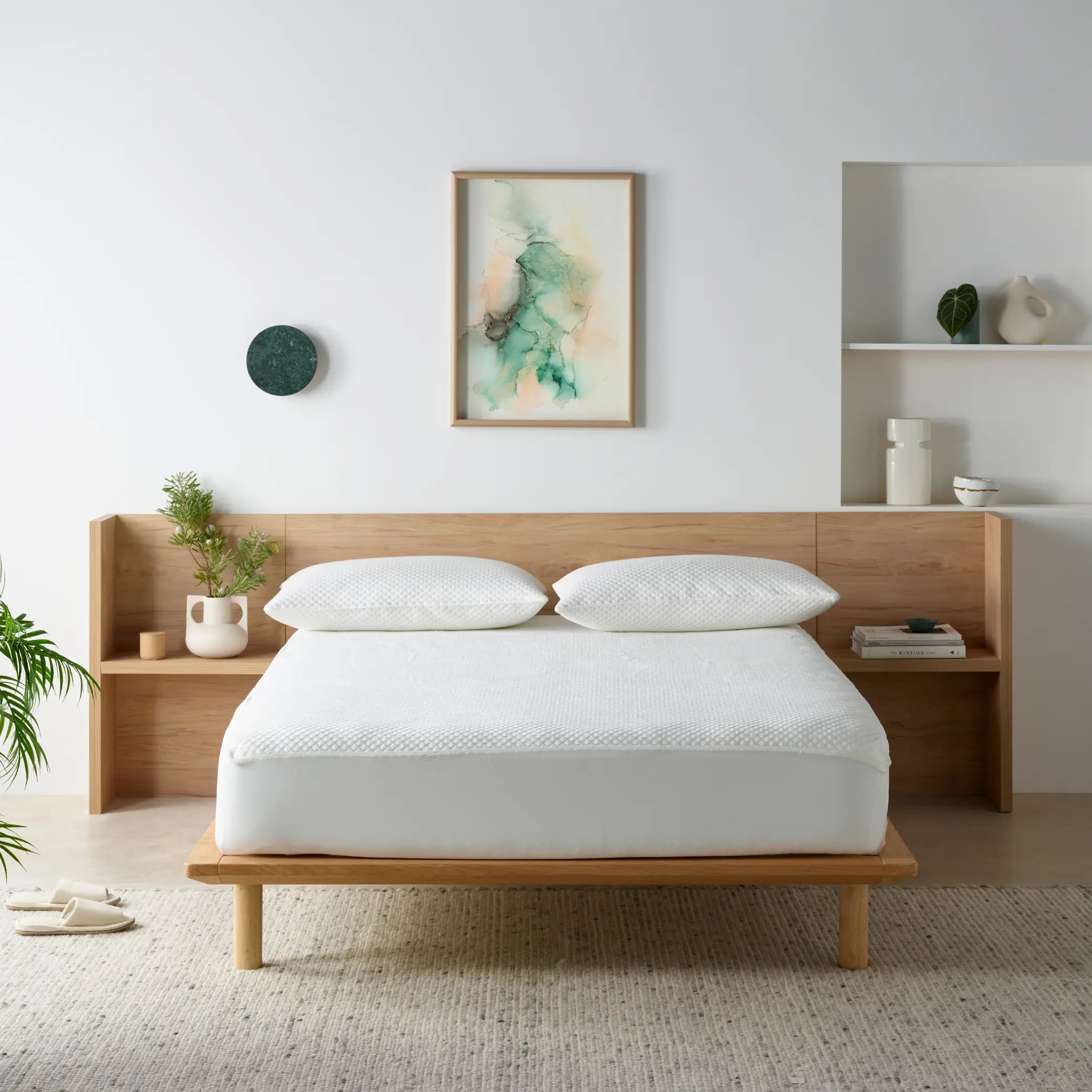 Modern bedroom featuring the Duradeluxe waterproof mattress protector with a quilted, breathable surface for superior comfort and spill protection. This hypoallergenic mattress cover safeguards against liquids, allergens, and dust mites, ensuring a dry and hygienic sleep environment.