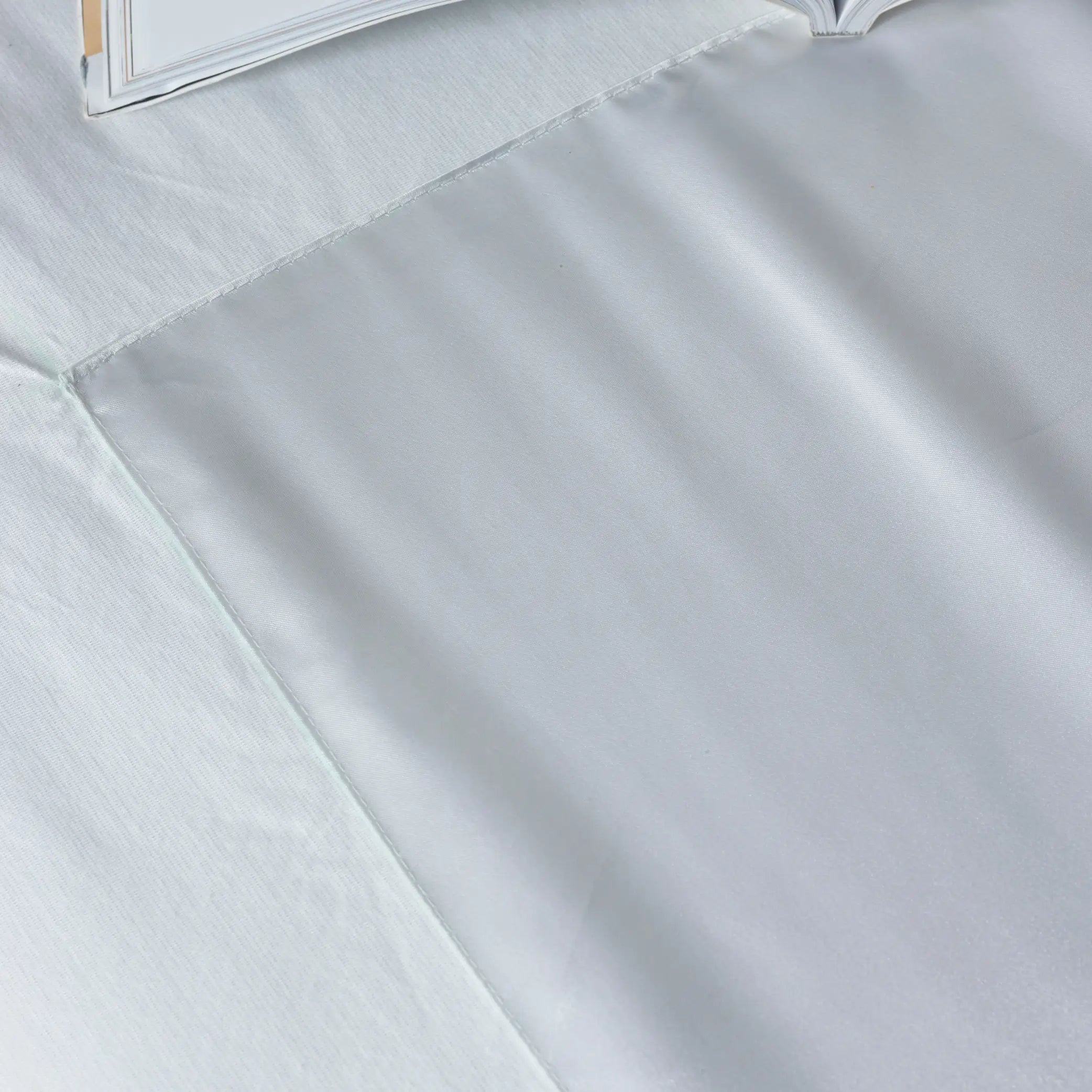 Close-up view of the Mobility Assist Waterproof Bed Protector, highlighting its smooth, durable, and waterproof fabric. Designed for incontinence protection, spill resistance, and enhanced comfort for individuals with limited mobility.