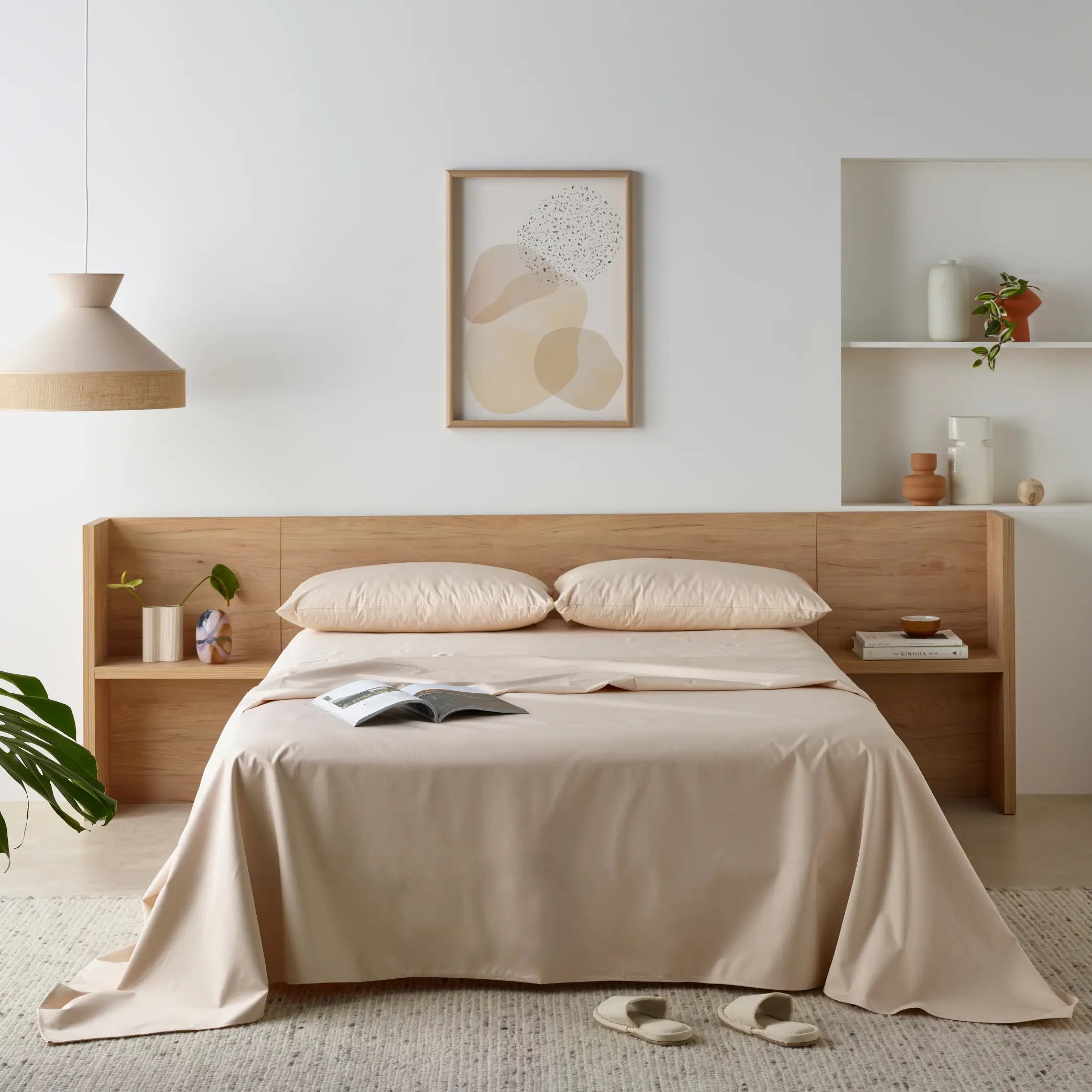 Neutral-toned Waterproof Bamboo Fitted Sheet set on a stylish wooden bed, designed for ultimate comfort and protection. This soft, breathable, and hypoallergenic sheet is liquid-resistant, deep-pocketed, and perfect for keeping your mattress fresh and dry.