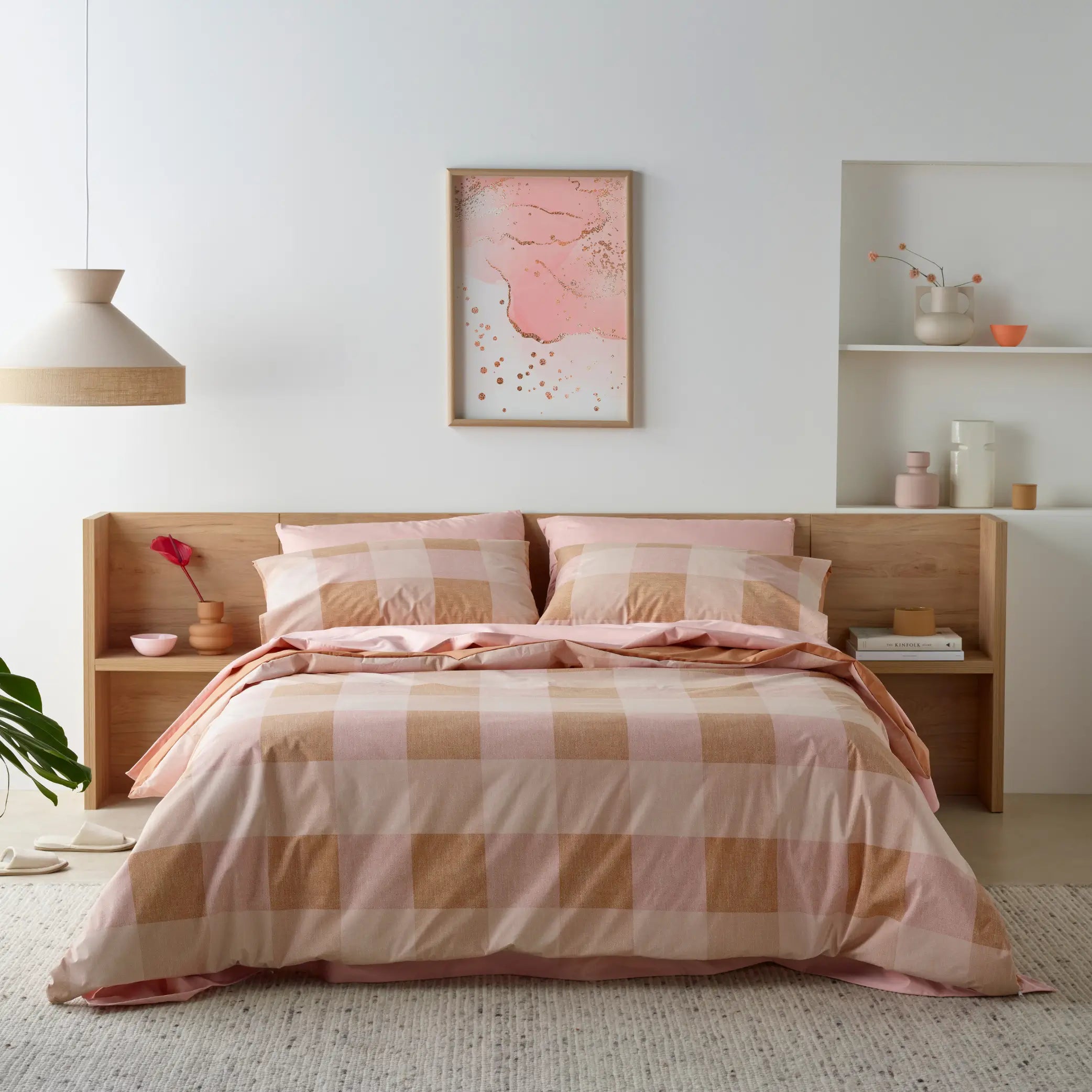 Modern bedroom featuring a checkered blush waterproof quilt cover set with matching pillowcases. Crafted from soft, breathable, and spill-resistant fabric, this stylish bed linen offers luxury, comfort, and protection for a worry-free sleep.