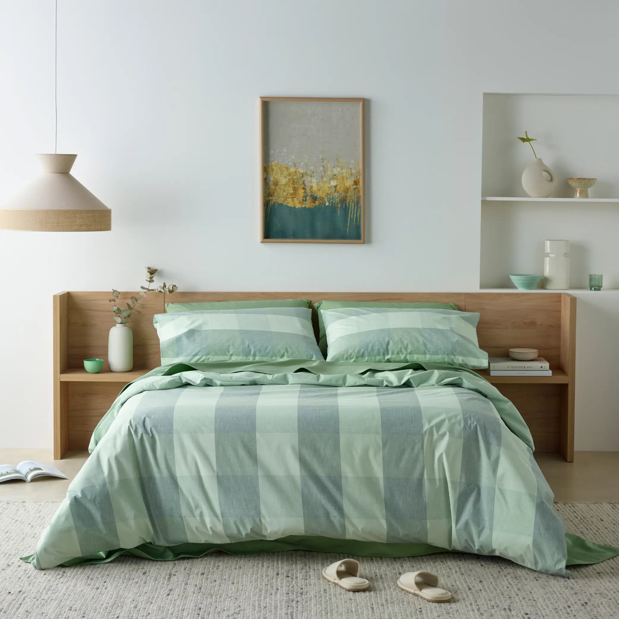 Stylish bedroom featuring a checkered green waterproof quilt cover set with matching pillowcases. Designed with soft, breathable, and spill-resistant fabric, this luxurious bedding set combines comfort, durability, and moisture protection.